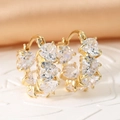 Elegant gold heart zircon hoop earrings featuring continuous cubic zirconia stones - Gold