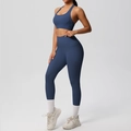Detail of high-waisted yoga pants featuring a convenient side pocket in navy blue fabric - S / Navy Blue