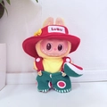 Labubu plush doll accessory wearing red hat and yellow T-shirt with green overalls - Fruit Carnival / First And Second Generation Keychains Are Compatible With La Cloth Dolls. Dolls Not Included.