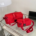 Red nylon oxford crossbody travel bag set in small and large cylinder shapes - Red
