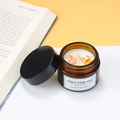 Scented soy candle in amber glass jar with dried orange petals and ONLY FOR YOU label - Golden Silk Petals
