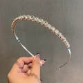 Elegant silver metal headband with pavé-set rhinestones for a minimalist sparkling look - Silver