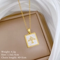 Macro view of gold shell pendant with rhinestone airplane and technical product data - Zirconia Airplane Shell Square Pendant (H551)
