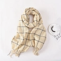 Winter checkered scarf in creamy white with black grid patterns and fringe detail - Off-white