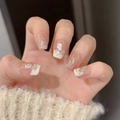 Elegant press-on nails with shell fragments, gold foil accents, and nude french style - Large (L) / Stiletto Shape / 1371-Sharp Almond