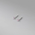 Detailed view of sterling silver four-prong stud earrings with pink cubic zirconia stones - 999 Fine Silver Pair - 2mm Light Pink Zirconia