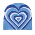Detalle de la textura de punto de un gorro de invierno con patrón de corazón azul - Azul Cielo