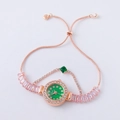 Detail of rose gold bracelet watch with green dial, pink gemstones and crystal chain - Rose Gold-Round Green Dial