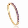 Elegant 18k gold plated wave bangle with channel-set purple baguette gemstones - Purple