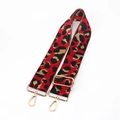 Detail of red leopard jacquard bag strap with gold metal lobster clasps and buckle - Red Gold Buckle