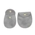 Detailed view of grey velvet jewelry pouches with gold snap button closure mechanism - 7.5x11.5cm / Premium Grey