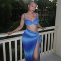 Detail of blue gradient two-piece set featuring knotted bustier and high slit wrap skirt - S / Blue