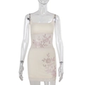 Dettaglio del set in maglia beige con paillettes floreali e decoro in strass - S / Albicocca