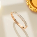 Rose gold stainless steel bracelet for women with triple row of sparkling crystals - Rose Gold