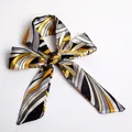 Long silk scarf S12 with abstract geometric patterns tied in an elegant bow knot - S12-Yellow Black Radial Geometric