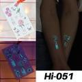 Luminous blue floral and butterfly tattoo sticker Hi-051 showing glow in the dark effect - Hi-051 (Butterfly in Bottle)