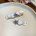 Elegant ocean-themed hair clips featuring iridescent white shells and a blue glitter starfish - 24 Duckbill Clips - Gold - White - Single Clip