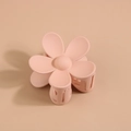 Close-up of pink matte flower hair claw clip with durable spring and teeth - Individual Packaging / Lotus Pink