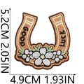 Detailed size view of horseshoe lucky patch with brown embroidery and daisy flowers - Horshoe Daisy Flower Style (No.6)