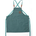 Dark green thick canvas apron with brown leather details and cross-back straps - Emerald Green