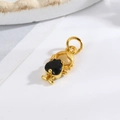 Detail of a golden girl pendant with a black heart-shaped gemstone and top hanging loop - Little Girl - Black Heart (Style B)