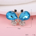 Macro shot of 33mm blue rhinestone butterfly charm with detailed size measurements - D272 Crystal Butterfly (Lake Blue)
