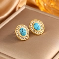 Macro shot of gold retro stud earrings with turquoise stones and shimmering zircons - Oval Inlaid / Gold + Deep Blue Turquoise
