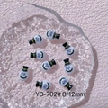 Macro view of tiny white resin ghosts with black hats and purple eyes for Halloween nail art - YD-702# Ghost with Top Hat