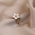 Elegant floral alloy brooch with white enamel petals, green leaves, and crystal tassels - Gardenia #574