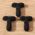 Detailed close-up of three black 3D T-letter charms with micro-rose texture for DIY jewelry - Letter T / 10 Pieces Pack / Black