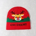 Close-up of Oh Deer text and reindeer pattern on red and green knitted Christmas beanie - Yellow Reindeer Head