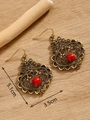 Detailed size view of bohemian antique gold earrings with red stone inlay on wood - Gold FX757 With Turquoise