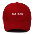Close-up of white CAT DAD embroidery on a red cotton twill six-panel baseball cap - Adjustable / Burgundy