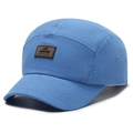Blue 5-panel canvas baseball cap with brown leather label from a side perspective - Adjustable / Sky Blue