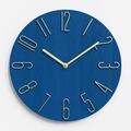 Modern 12-inch round wall clock with dark blue wood grain dial and gold metal markers - Cobalt Blue With Champagne Gold Numbers