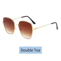 Oversized gold metal frame sunglasses featuring stylish brown gradient lenses - Gradient Tea