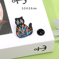 Cartoon black cat enamel pin with blue and orange flower patterns, size 3.0 x 2.6 cm - Style D Black Cat