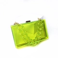 Detail of neon green transparent acrylic clutch bag with thick chain handle and metal clasp - Transparent Yellow