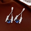 Detail of silver needle earrings with deep blue rectangular stone and white zircon accents - Silver-Dark Blue (Rectangle Gem)