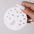 Close-up of silver stud earring set with pearls and crystals on fashion jewelry card - 6 Pairs Set / E0596-1 (Silver Pearl Star Moon Set)
