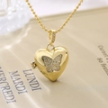 Collana con medaglione a cuore placcato oro con farfalla in zirconi e catena a sfere - Motivo Farfalla (23348)