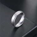 Detail view of 6mm matte titanium steel ring with brushed texture and polished beveled edges. - Size 5 / Silver