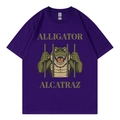 Women's deep purple round neck T-shirt featuring a cartoon alligator alcatraz graphic - Purple