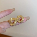 Orecchini geometrici dorati a spirale con una speciale finitura granulata opaca - Triangolo Intrecciato Oro (29#)