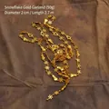 2.7m golden Christmas bead string featuring snowflake, snowman and tree motifs - Golden Snowman Bead String