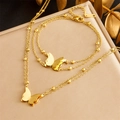 Golden stainless steel jewelry set with double-layered butterfly pendant and bead chain - Necklace and Bracelet Set (N2801 B1355)