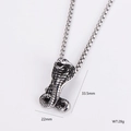 Macro view of silver cobra snake pendant with dimensions 33.5mm by 22mm on box chain - Cobra Style (2)
