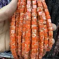 Vue macro de perles carrées en pierre naturelle orange avec texture marbrée pour bijoux - 4x4mm (Environ 38cm Fil) / Pierre Impériale Orange