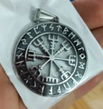 Macro detail of Nordic Viking Vegvisir compass pendant with Elder Futhark rune engraving - Viking Compass Runes Style (Style 15)