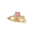 Macro shot of gold octopus ear cuff with pink cat-eye stone and white cubic zirconia - Octopus / Gold-Pink Octopus